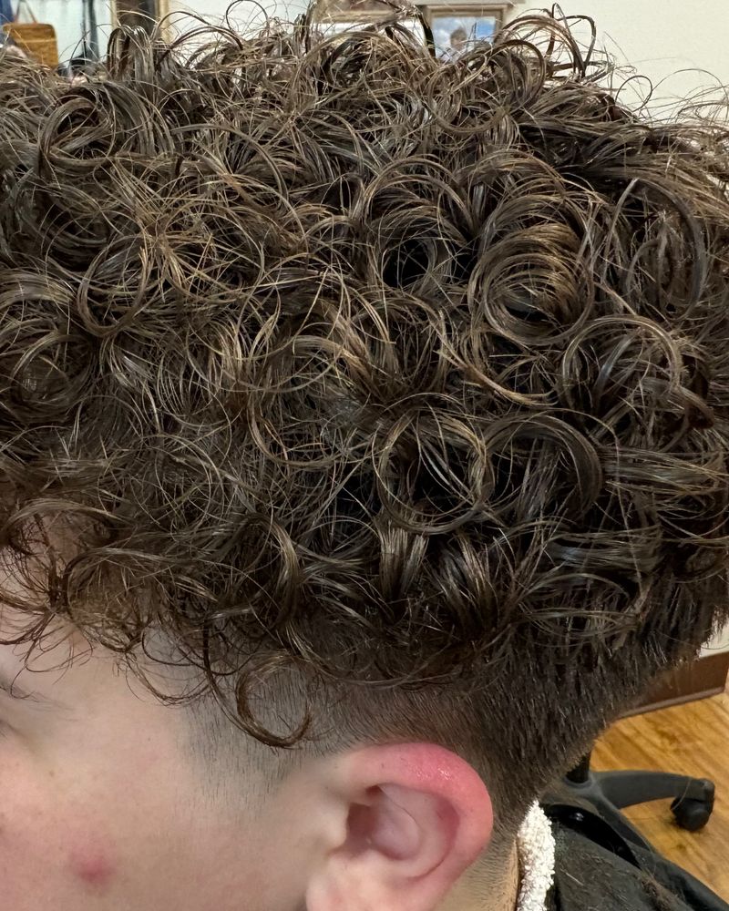 Man’s textured waves with a faded side