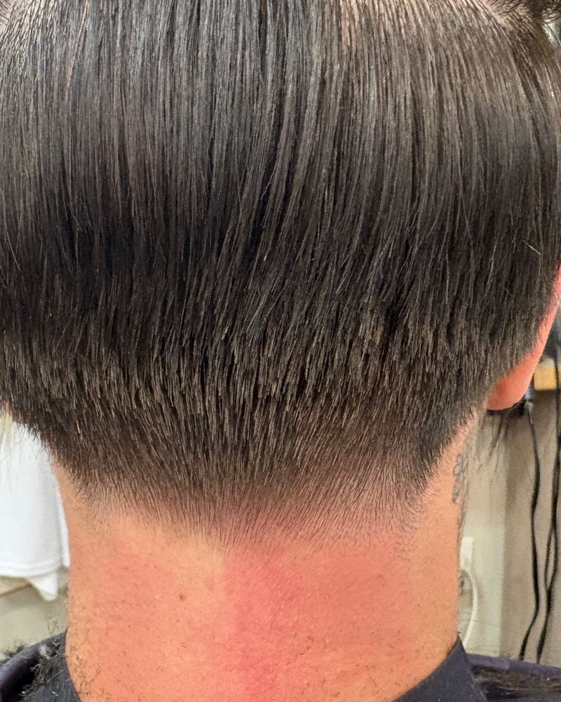 Clean tapered haircut at the neckline